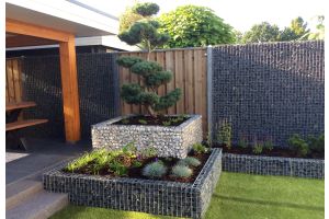 hochbeet_gabionen_mit_basalt_und_weissenbacher_zierkies_1 – Bruchsteine